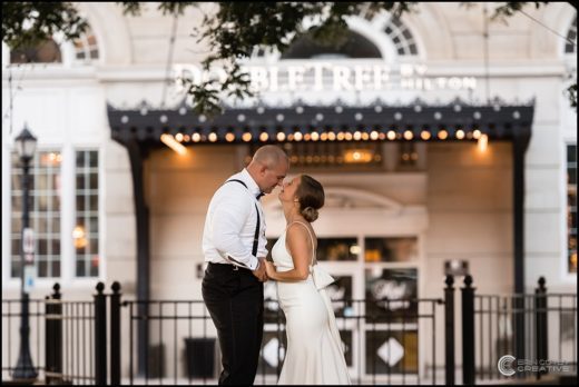 Outdoor photographs of couple at Doubletree by Hilton: Hotel Utica